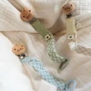 Держатель для пустышки BIBS Paci Braid Petrol/Baby Blue Держатель для пустышки BIBS Paci Braid Petrol/Baby Blue