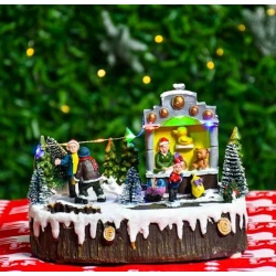 Фигурка Дети и елки, красная/белая/зеленая, 20х14х15 см Фигурка Дети и елки, красная/белая/зеленая, 20х14х15 см