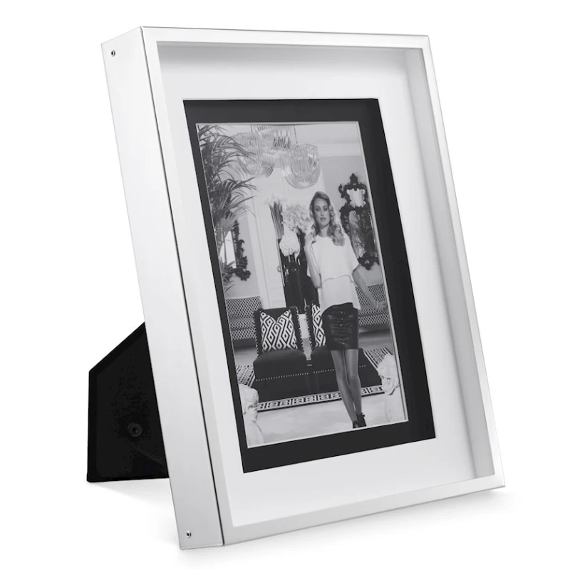 Рамка для фото Eichholtz 106169 Picture Frame Gramercy L silver finish 20.5x26 см,толщина стекла 1.7 см,отделка серебро,прозрачное стекло Рамка для фото Eichholtz 106169 Picture Frame Gramercy L silver finish 20.5x26 см,толщина стекла 1.7 см,отделка серебро,прозрачное стекло